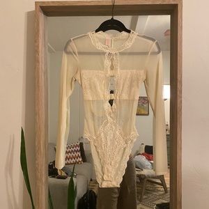 We are Hah White Lace Bodysuit